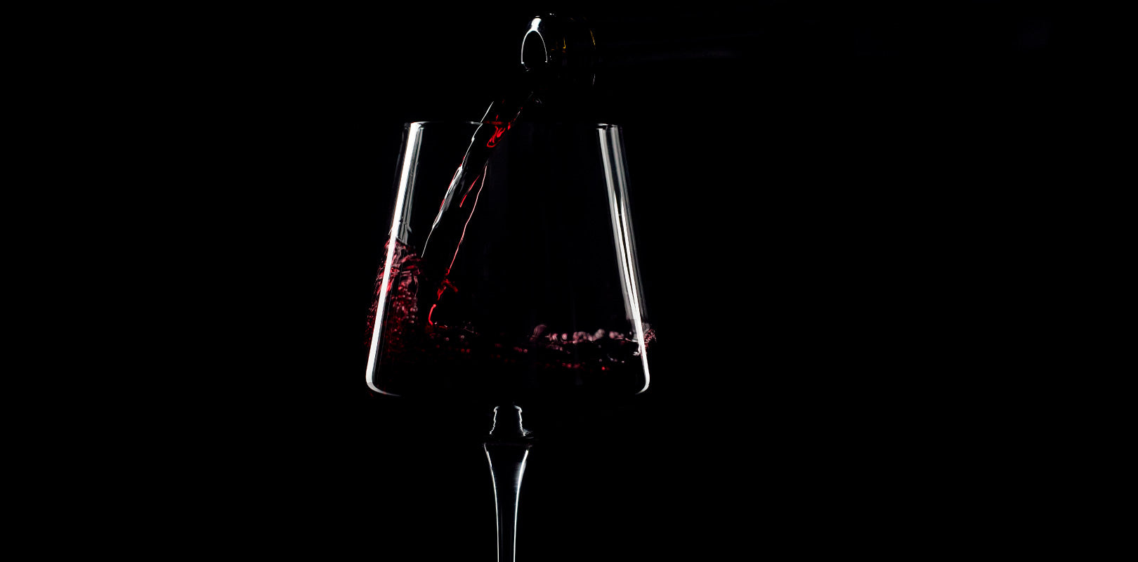 Wine pouring into glass